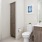 Bathroom with wood vanity, large tub, and linen closet