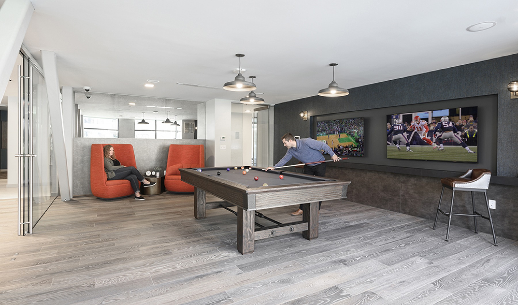 Emery Flats Clubroom  Game room with pool table, flatscreen TV and seating